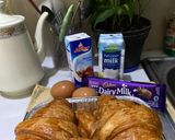 Foto langkah ke 1 dari resep Chocolate Croissant Pudding.