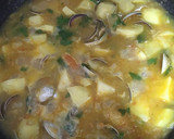 Foto del paso 4 de la receta: Merluza con patatas y almejas