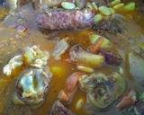 Foto del paso 10 de la receta: Manitas de cerdo a los reales!