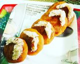 A picture of step 12 of Kakara Pitha.