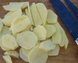 Foto del paso 1 de la receta: Papas al queso crema en la parrilla