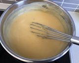 A picture of step 3 of Eggless Strawberry Custard.