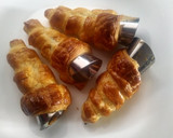 Foto del paso 6 de la receta: Canutillos rellenos de kinder
