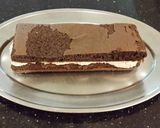 A picture of step 18 of Chocolate Layer Torte with Coconut Cream Filling and Frosting.