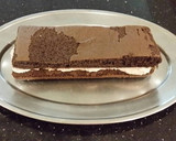 A picture of step 18 of Chocolate Layer Torte with Coconut Cream Filling and Frosting.
