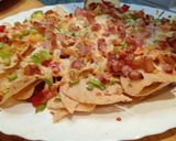 A picture of step 4 of Mexican Nachos with Peppers, Onion, and Bacon.
