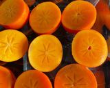 A picture of step 1 of Honey-Baked Persimmons with Star anise and Cinnamon:.