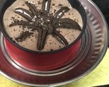 A picture of step 8 of Eggless: Oreo Chocolate Vanilla Ice Cream Cake.