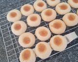 A picture of step 7 of Jam Thumbprint Cookies.