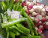 A picture of step 3 of Karonda pickle.