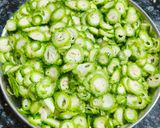 A picture of step 1 of Kaju Karela.