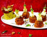 A picture of step 7 of Puliyogare cheese burst bombs in pizza sauce.
