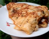 Hình bước làm 2 của món Trứng chiên nấm rơm hành tây