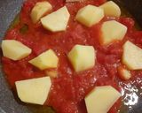A picture of step 3 of Trombetta Squash with Tomato and Potatoes.