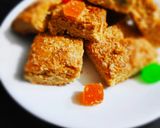 A picture of step 12 of Fruity Coconut Crumble Squares.