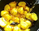 A picture of step 3 of Aloo posto.