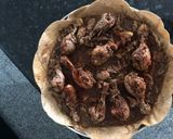 A picture of step 4 of Baked Mussakhan on bread.