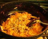 A picture of step 3 of Spicy aromatic nutritious stuffed bitter gourd in tomato sauce.