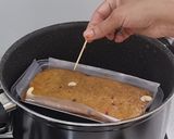 A picture of step 7 of Christmas Special Eggless,  Spongy Plum Cake without Oven.