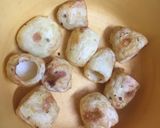 A picture of step 1 of Baked dum Aloo with gravy.