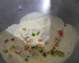 অমলেট র‍্যাপড টোস্ট (omelette wrapped toast recipe in Bengali) রেসিপি ধাপ - 4 ছবি