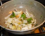 A picture of step 3 of Stir fry cabbage with coconut.