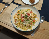 A picture of step 7 of Seafood linguine.