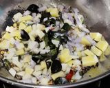 A picture of step 1 of Daliya upma (Broken wheat upma).