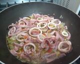 Foto del paso 5 de la receta: Arroz con azafrán y calamares