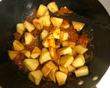 A picture of step 6 of Echore Kosha (Green Jackfruit Curry).