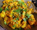 A picture of step 4 of Aloo Gobi Matar (Potato, Cauliflower, and Pea Curry).