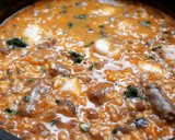 Foto del paso 9 de la receta: Arroz caldoso de rape y salchichas