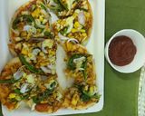 A picture of step 3 of Paneer tikka pizza.