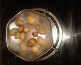A picture of step 1 of Baby Potatoes Simmered In Rich Onion Tomato Gravy.