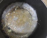A picture of step 3 of Mustard leaves in Garlic sauce.