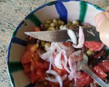 Foto del paso 3 de la receta: Ensalada de habitas baby en aceite con anchoas en conserva