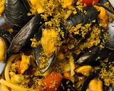 Foto del passaggio 5 della ricetta Spaghetti risottati con cozze e pomodorini