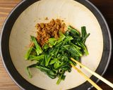 A picture of step 11 of Blanched spinach with sesame dressing.