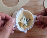 A picture of step 5 of Ricotta and Basil Ravioli with Tomato Sauce.