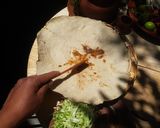 A picture of step 8 of Oaxacan Tlayudas.