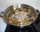 Foto del paso 8 de la receta: Calamares rellenos del mar con timbal de arroz