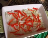 Foto del paso 1 de la receta Lubinas sobre cama de patatas al aroma de lima y pimienta rosa