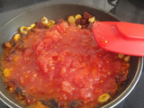 Pasta in spicy chorizo tomato sauce with capers