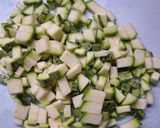 A picture of step 1 of Strapatsada with Zucchini and Feta.