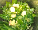 A picture of step 1 of Green Pav Bhaji.