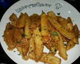 A picture of step 6 of Chatpatay crispy potato wedges.