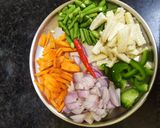 A picture of step 1 of CHEESEY BAKED VEGGIES And CHICKEN.