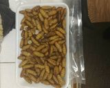 A picture of step 1 of Fried silk worms.