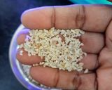 A picture of step 5 of Broken rice tomato bath.