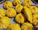 आंब्याच्या रसातील मोदक (ambyachya rasatil modak recipe in marathi) रेसिपी स्टेप 8 फोटो 
